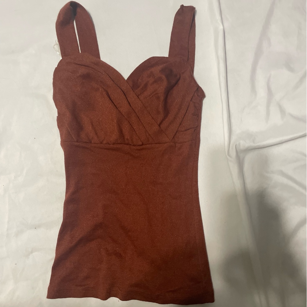 Brown metallic tank inc